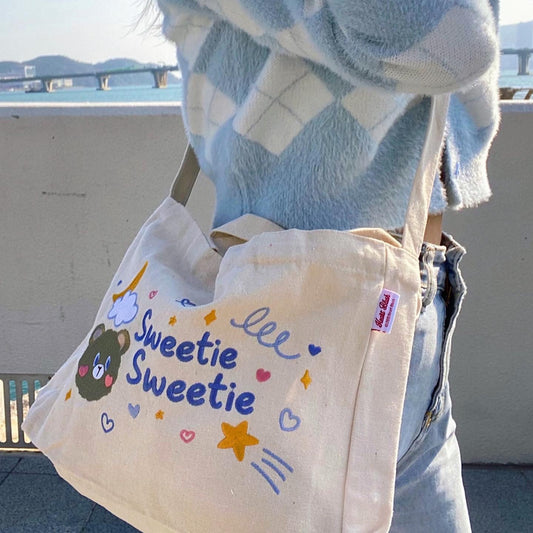 Koubbi星星帆布斜背包